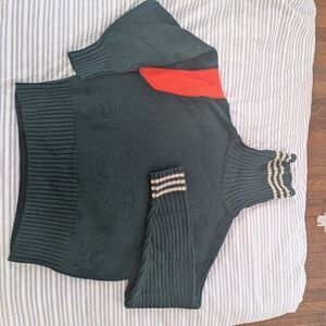 Dark Green Sweater with Red and White Accents